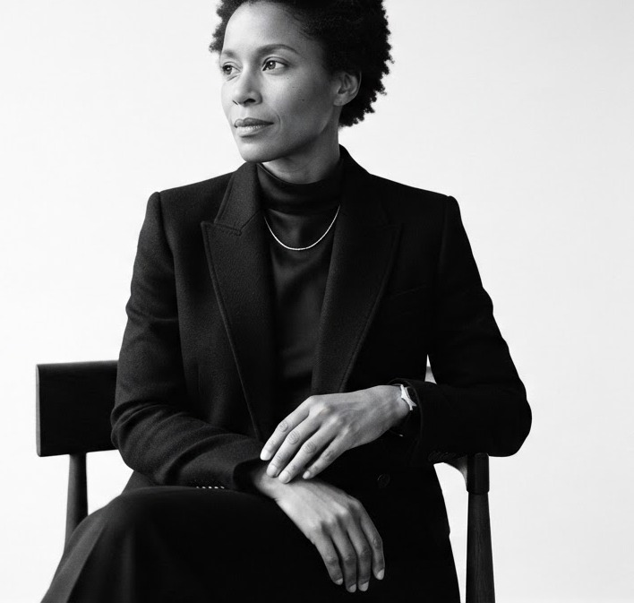 A black and white editorial portrait of the studio founder.